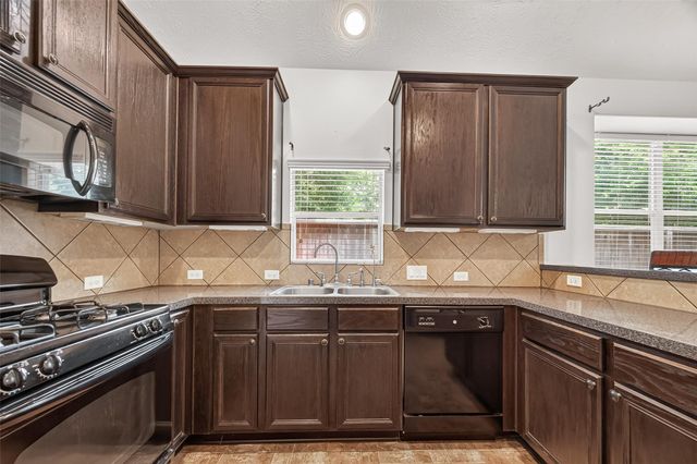 10511 Whisper Bluff Drive, Humble, TX 77396