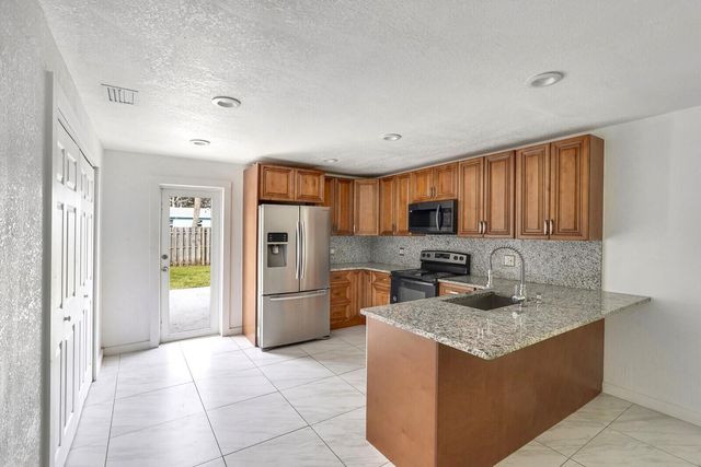 4389 BELLEWOOD Street, Palm Beach Gardens, FL 33410