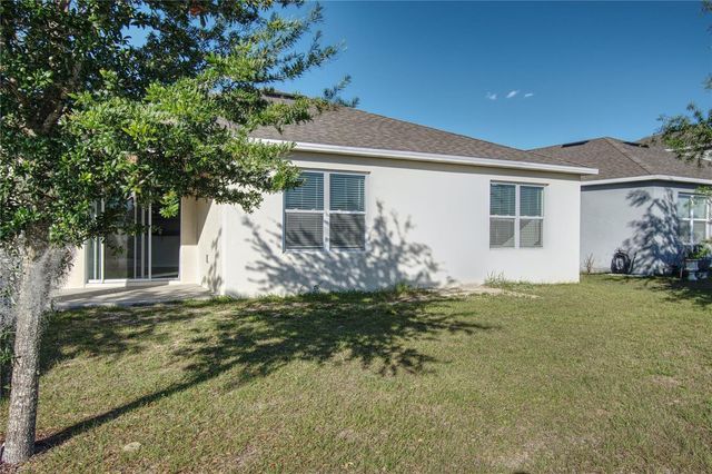521 NICKEN GROVE, Davenport, FL 33837