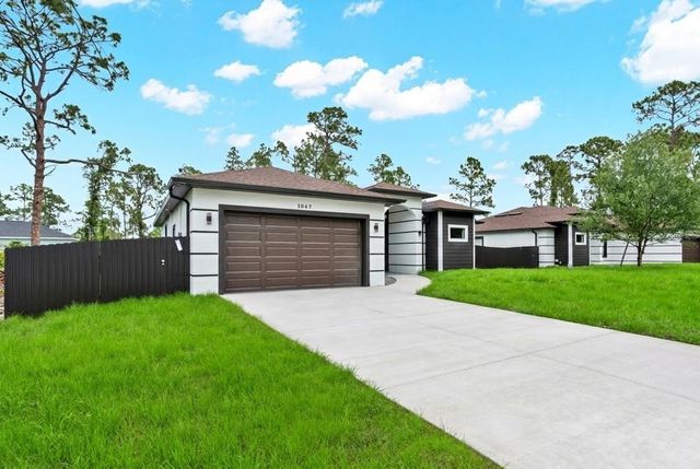 1047 MERRY STREET E, Lehigh Acres, FL 33974