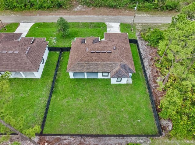 1047 MERRY STREET E, Lehigh Acres, FL 33974