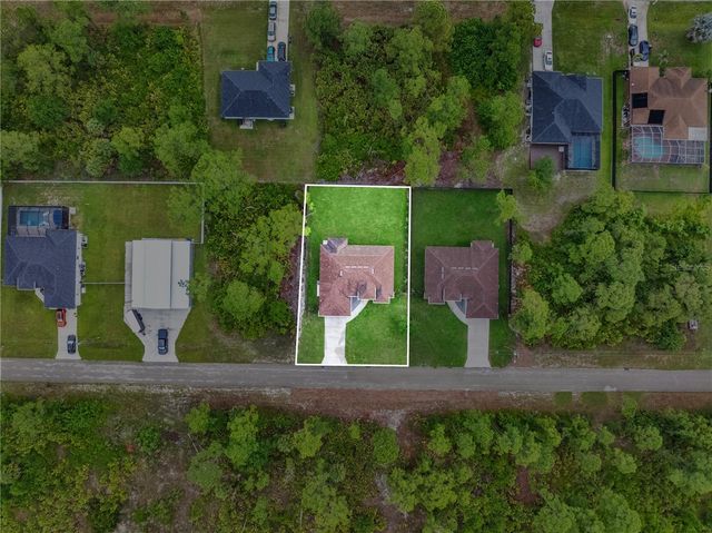 1047 MERRY STREET E, Lehigh Acres, FL 33974