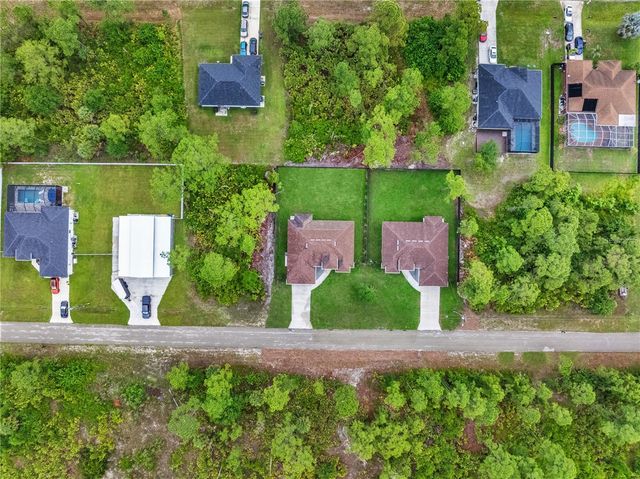 1047 MERRY STREET E, Lehigh Acres, FL 33974