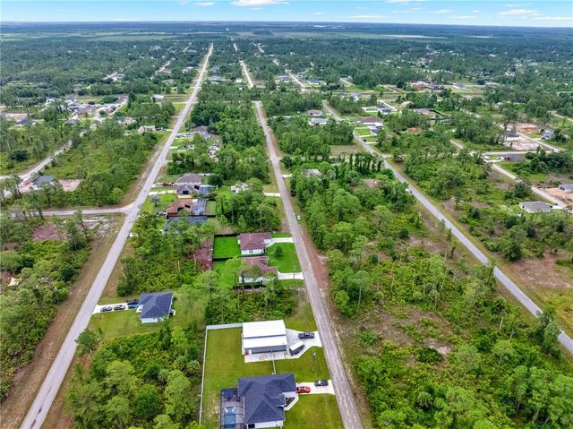 1047 MERRY STREET E, Lehigh Acres, FL 33974
