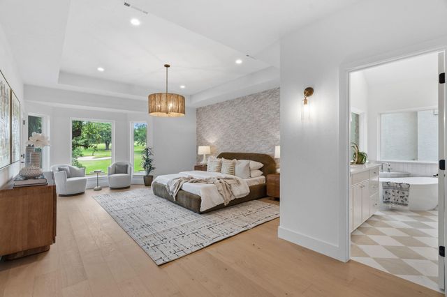 50 Tiburon DR, The Hills, TX 78738