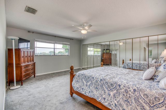 495 Prestwick Circle, Palm Beach Gardens, FL 33418
