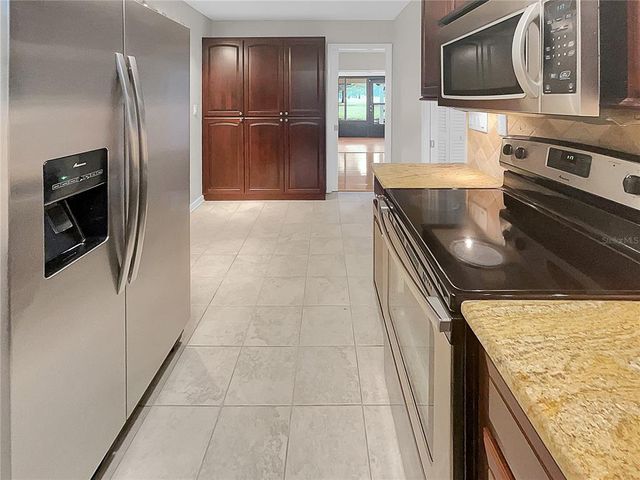 13516 PALMWOOD LANE, Tampa, FL 33618