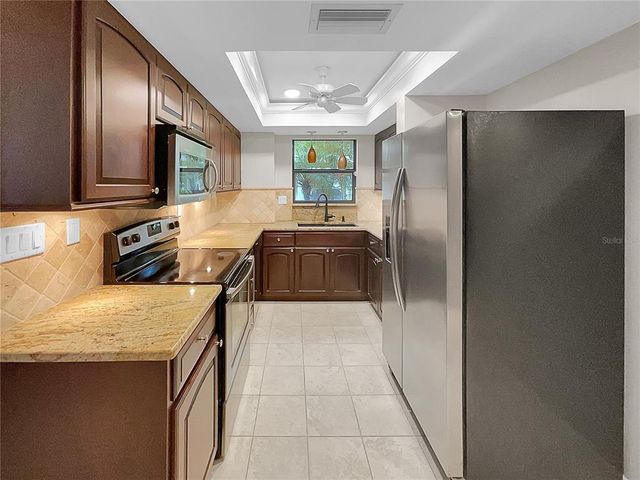 13516 PALMWOOD LANE, Tampa, FL 33618