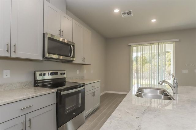 1820 WOODLEAF HAMMOCK COURT, Bradenton, FL 34211
