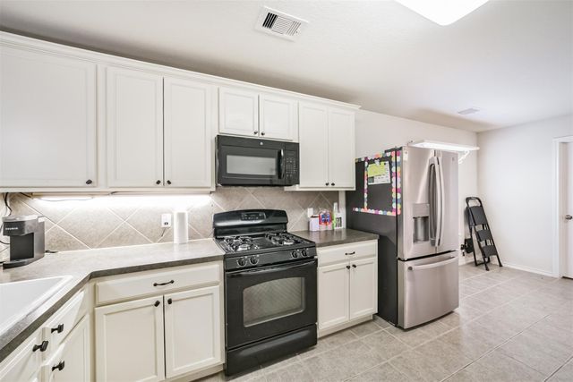 1609 Peach Dale Court, Conroe, TX 77301