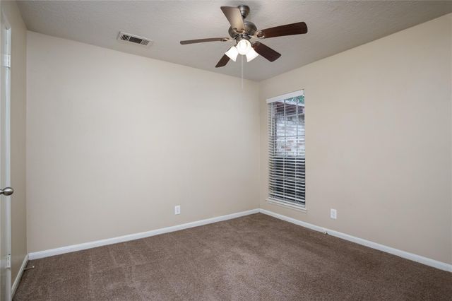 13215 Lake Breeze Lane, Willis, TX 77318