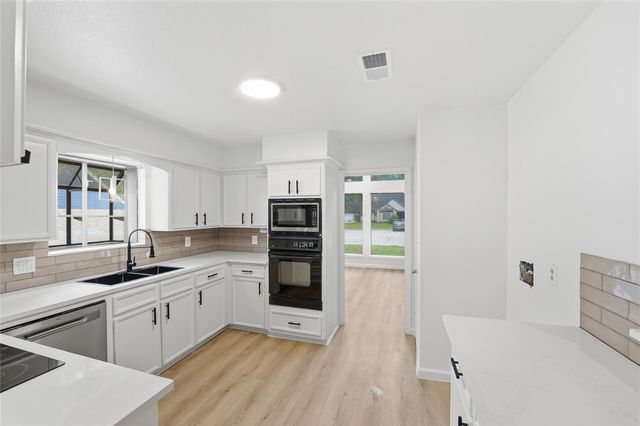 1907 Tangle Lake Drive, Kingwood, TX 77339