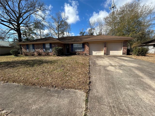 1805 King Arthur Court, Pinehurst, TX 77630