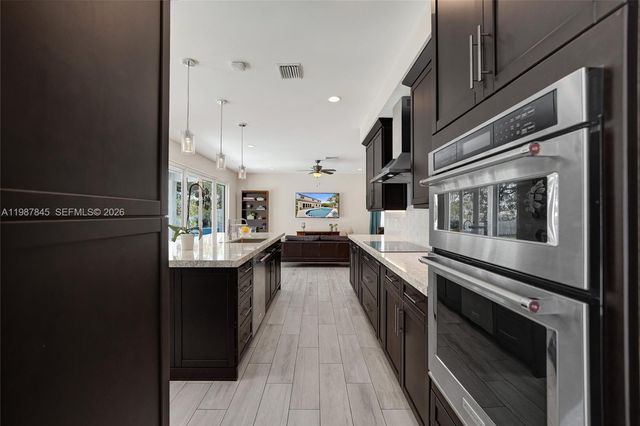 484 Cambridge Dr, Weston, FL 33326