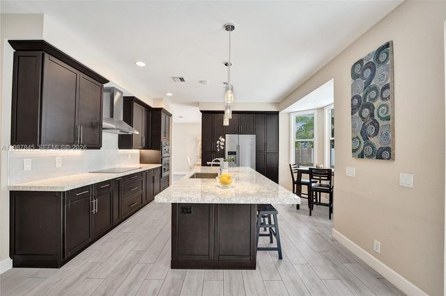 484 Cambridge Dr, Weston, FL 33326