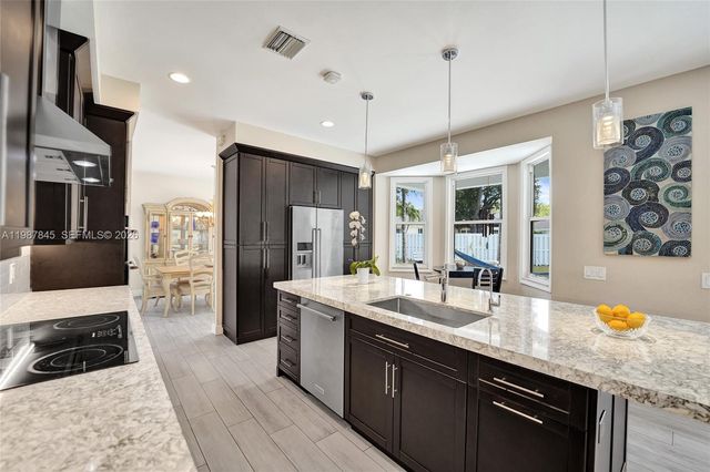 484 Cambridge Dr, Weston, FL 33326