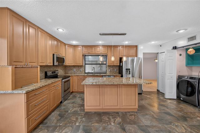 16831 Patio Village Ln, Weston, FL 33326