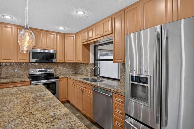16831 Patio Village Ln, Weston, FL 33326
