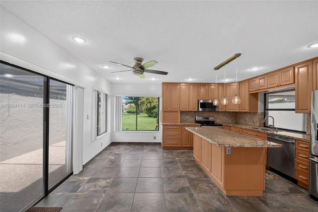 16831 Patio Village Ln, Weston, FL 33326