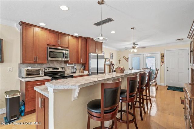 1412 Club Gardens Drive NE, Palm Bay, FL 32905
