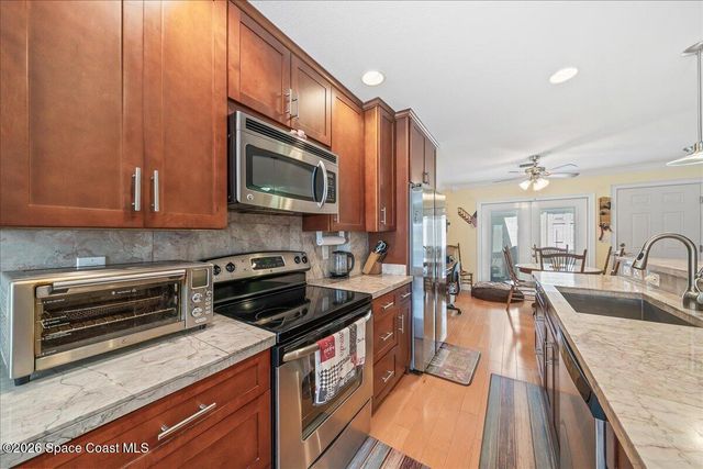 1412 Club Gardens Drive NE, Palm Bay, FL 32905