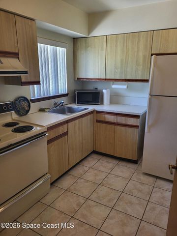 1412 Club Gardens Drive NE, Palm Bay, FL 32905