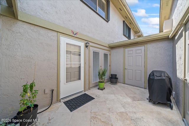 1412 Club Gardens Drive NE, Palm Bay, FL 32905