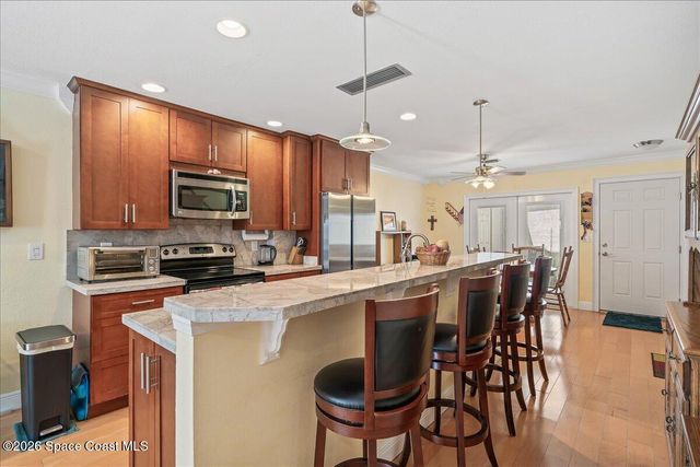 1412 Club Gardens Drive NE, Palm Bay, FL 32905