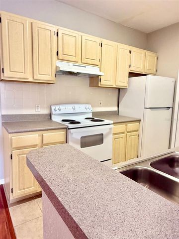 8911 LEGACY COURT 207, Kissimmee, FL 34747