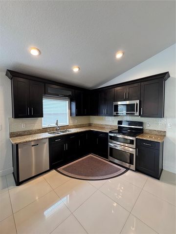 2823 MAGUIRE DRIVE, Kissimmee, FL 34741