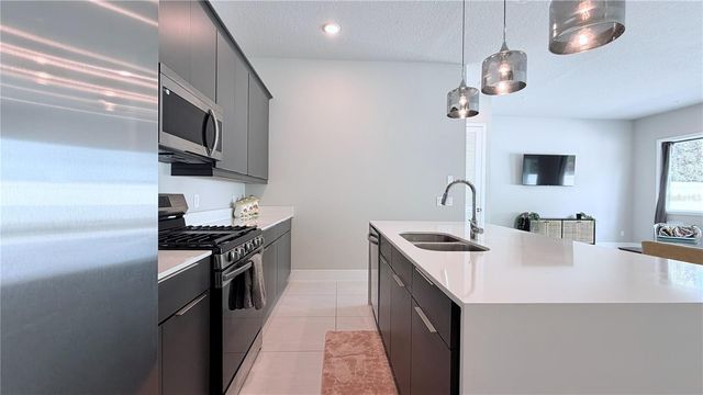 7760 SANDY RIDGE DRIVE 116, Reunion, FL 34747