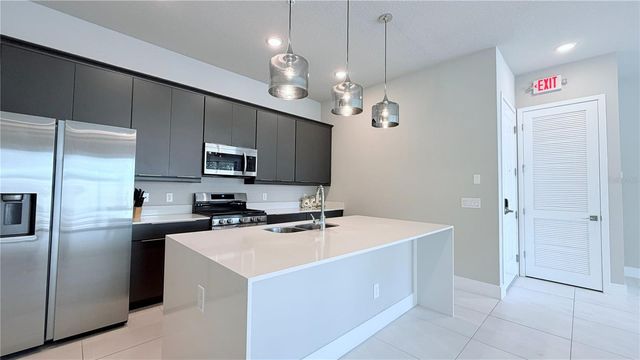 7760 SANDY RIDGE DRIVE 116, Reunion, FL 34747