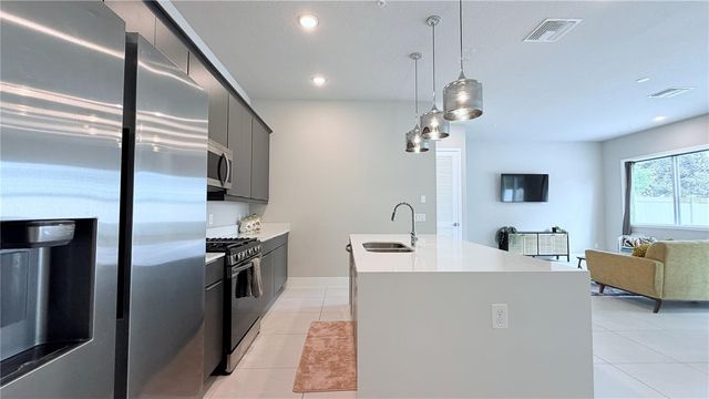 7760 SANDY RIDGE DRIVE 116, Reunion, FL 34747