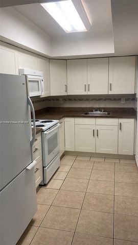 200 NE 45th St 208, Oakland Park, FL 33334