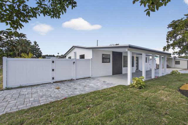 451 Dionne Drive, West Palm Beach, FL 33406