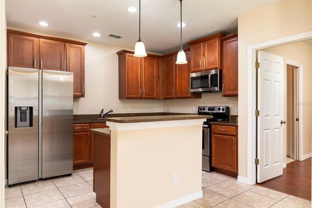 9866 TIVOLI VILLA DRIVE, Orlando, FL 32829