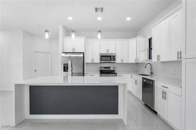 2602 73rd ST W, Lehigh Acres, FL 33971
