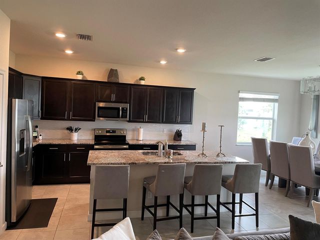 7413 NW Greenspring Street, Port St. Lucie, FL 34987