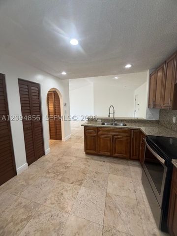 10125 W Sunrise Blvd 303, Plantation, FL 33322