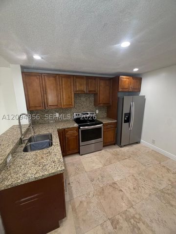 10125 W Sunrise Blvd 303, Plantation, FL 33322