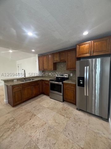 10125 W Sunrise Blvd 303, Plantation, FL 33322