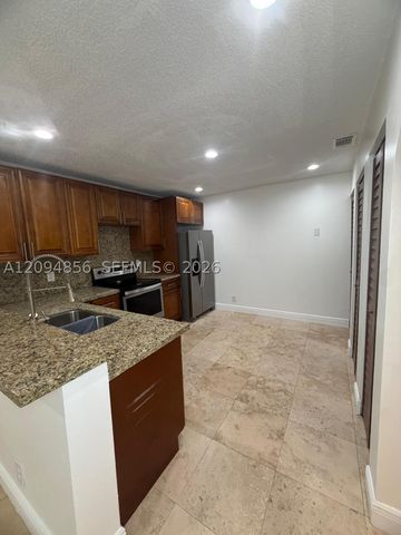 10125 W Sunrise Blvd 303, Plantation, FL 33322