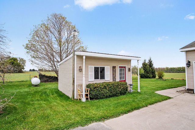 6423 Briggs Drive, Fairplain Twp, MI 48838