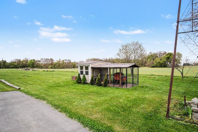 6423 Briggs Drive, Fairplain Twp, MI 48838