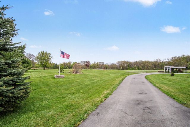 6423 Briggs Drive, Fairplain Twp, MI 48838