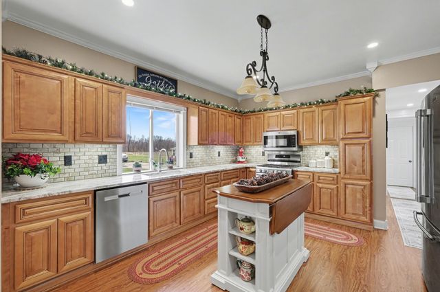 6423 Briggs Drive, Fairplain Twp, MI 48838