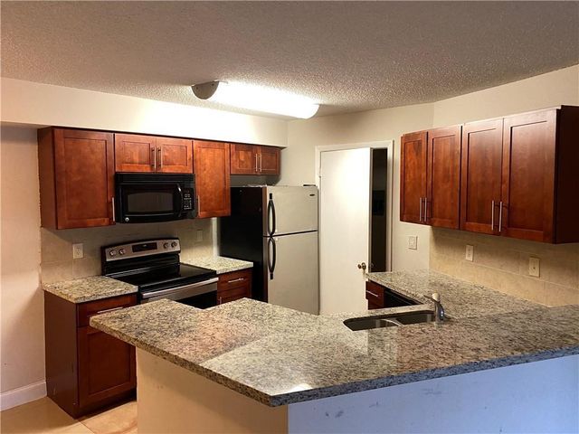 9999 Summerbreeze Drive 1004, Sunrise, FL 33322