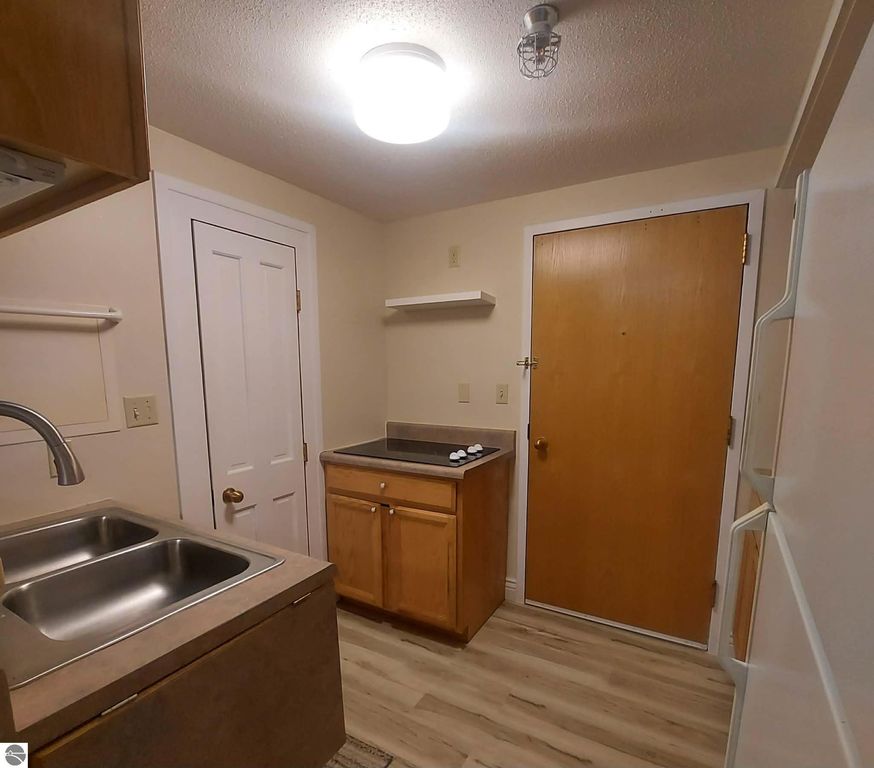 Image 3 of property listing at 5951 N Skeel Avenue # 119, Oscoda, MI 48750