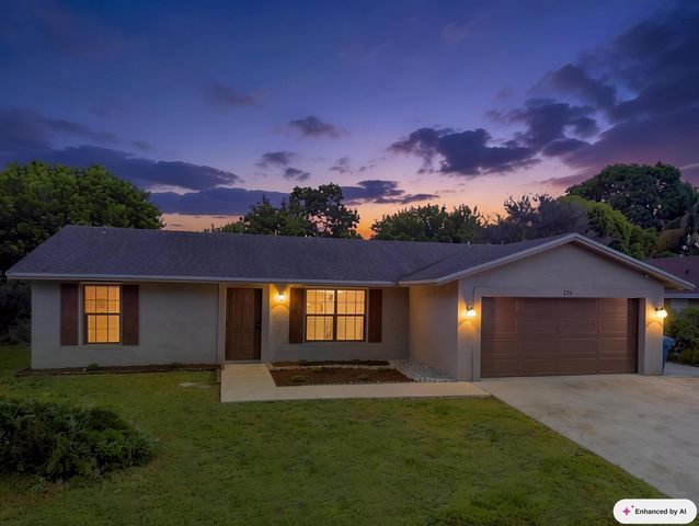 234 La Mancha Avenue, Royal Palm Beach, FL 33411