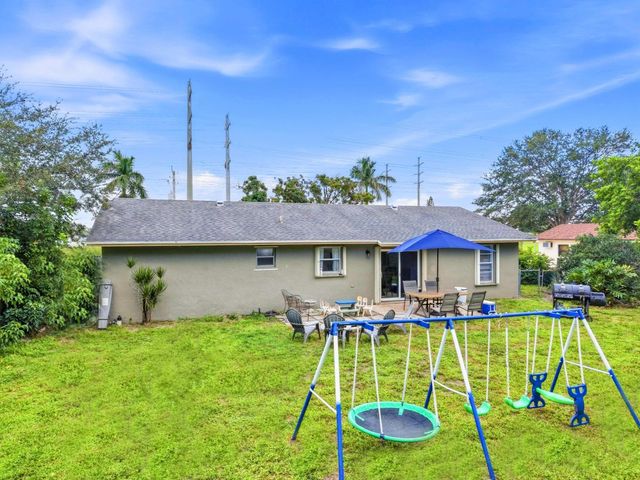 234 La Mancha Avenue, Royal Palm Beach, FL 33411